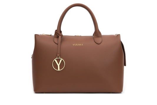 YUUMA Zuri Tote Bag - Baby Bags For Parents - Crossbody Diaper Bag Converts to Backpack - Vegan Leather - 7 Pockets - Ample Storage - Easy Clean - Modern Design - Stay Organized (Cinnamon)